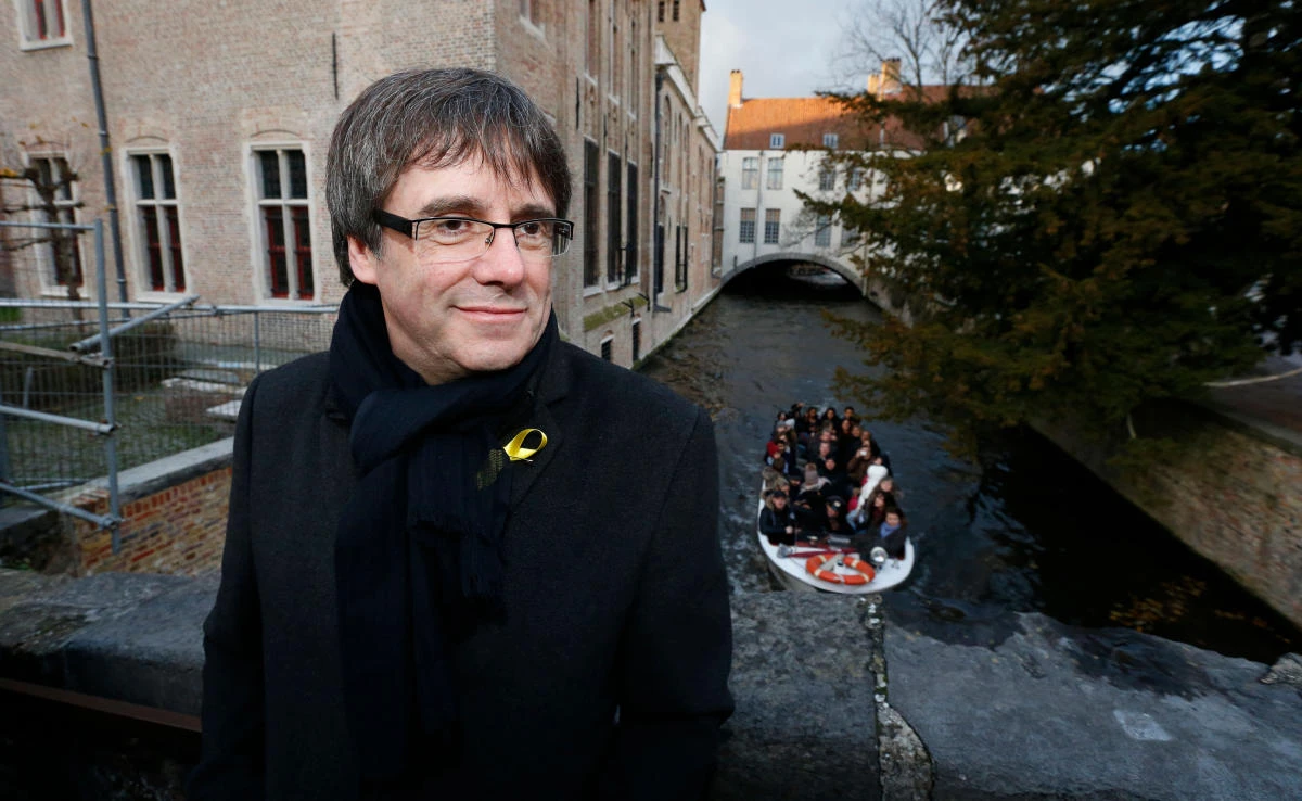 Catalan leader in exile Carles Puigdemont looks on during a visit to the city of Bruges on November 25, 2017. (BELGA via AFP)
