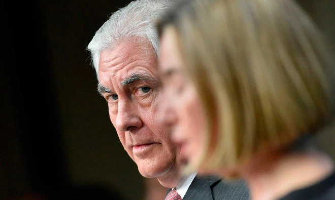 US Secretary of State Rex Tillerson, left, looks on next to EU foreign policy chief Federica Mogherini during a joint press conference at the EU Council building in Brussels on Tuesday. (AFP)