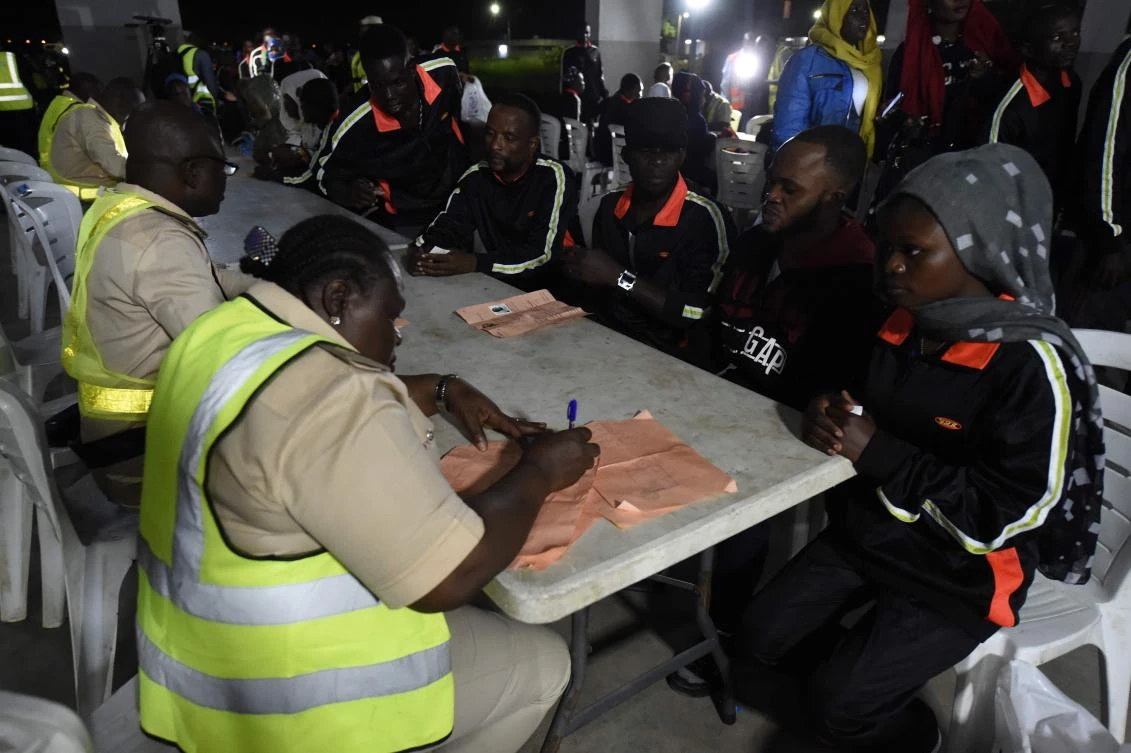 State officials screen 150 migrants from Libya at the Murtala Mohammed International Airport in Lagos, on December 5, 2017. (AFP)
