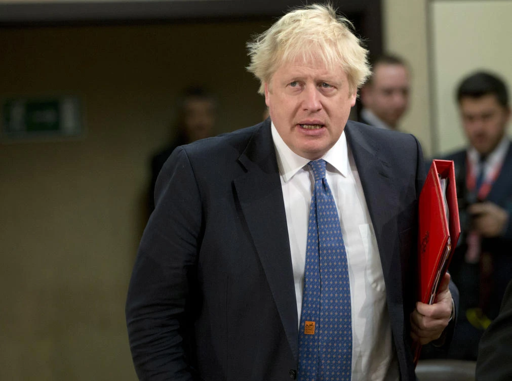 British Foreign Secretary Boris Johnson arrives for a meeting of the NATO-Georgia Council at NATO headquarters in Brussels on Wednesday, Dec. 6, 2017. (AP Photo/Virginia Mayo)