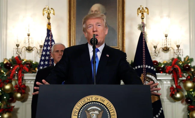 President Donald Trump speaks in the Diplomatic Reception Room of the White House. (AP)