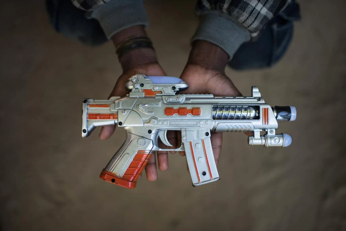 The Arakan Rohingya Salvation Army may “shift to cross-border attacks” using Bangladesh as a base for recruitment and training, conflict analysts ICG warned on Thursday. Above, a young Rohingya refugee holds a toy gun at the Shamlapur camp in Cox’s Bazar, Bangladesh. (AP)