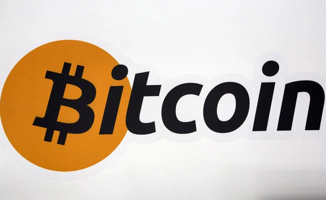 A Bitcoin logo is displayed at the Bitcoin Center New York City in New York’s financial district in New York on July 28, 2015. (REUTERS/Brendan McDermid/File Photo)