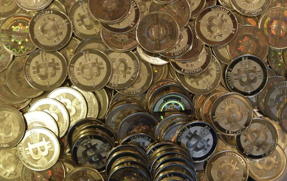 Bitcoin’s wild swings occurred as the financial community prepares for bitcoin futures to start trading on Sunday on the CBOE and a week later on the Chicago Mercantile Exchange. (AP)