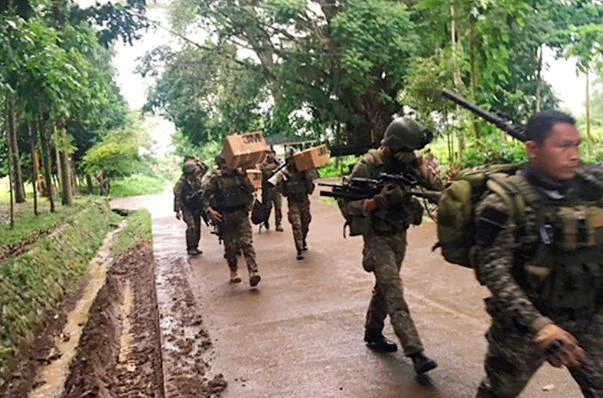 Local officials have agreed to extend martial law on the island, but stressed that this should not be used to curtail the movement of people. (AP)