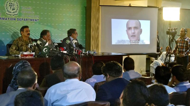 A file photo shows Indian spy Kulbhushan Jadhav's case being explained during a press conference in Islamabad. (AP)