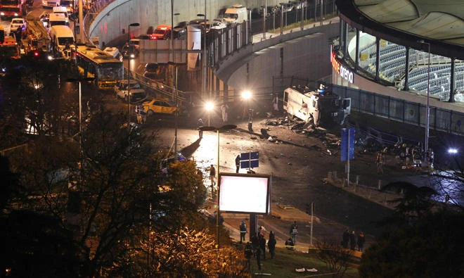 File: Fire fighters and police working at the site of a car bomb explosion outside the stadium of football club Besiktas in central Istanbul on December 10, 2016. Turkey marks one year since 46 people, mainly members of security forces, were killed in a bomb attack after a match outside the stadium of Istanbul football club Besiktas claimed by Kurdish militants. (AFP)
