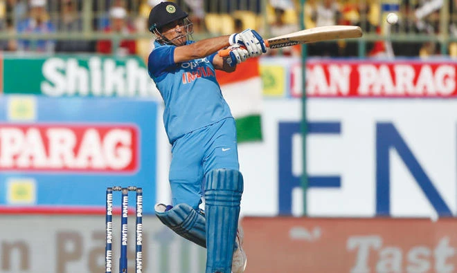 Mahendra Singh Dhoni plays a pull shot during his innings-save knock against Sri Lanka yesterday. (AP)