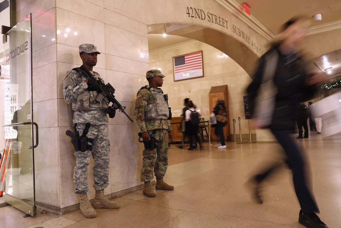 National Guardsman stand watch in Grand Central terminal on Dec. 11, 2017 in New York City. Police said that Akayed Ullah, 27, an immigrant from Bangladesh living in Brooklyn, set off a pipe bomb in an underground walkway near the Port Authority bus terminal. (John Moore/Getty Images/AFP)