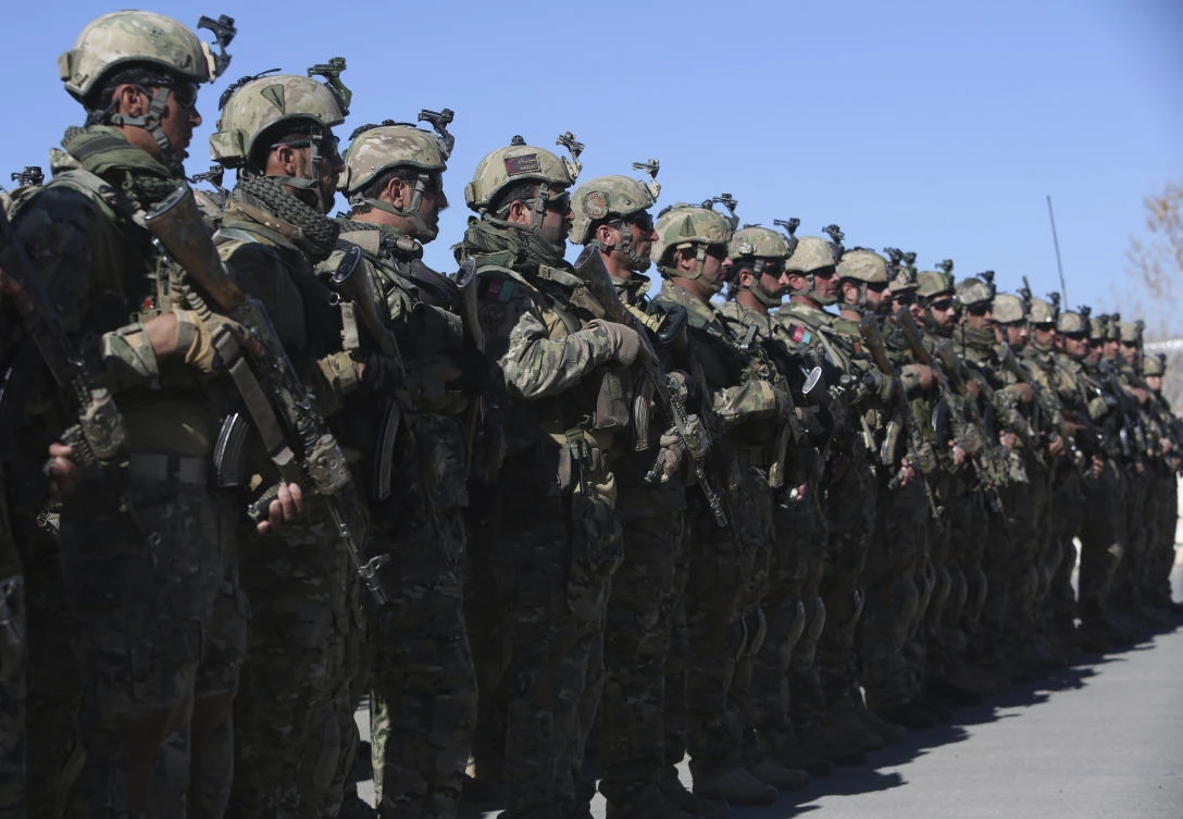 Afghan police special forces assemble for an exercise in the Mohammad Agha district of Logar province, eastern of Kabul, Afghanistan. (AP/Rahmat Gul)
