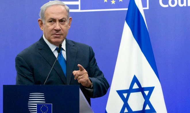 Israeli Prime Minister Benjamin Netanyahu addresses a media conference with European Union high representative Federica Mogherini at the EU Council building in Brussels on Dec.11, 2017. (AP)