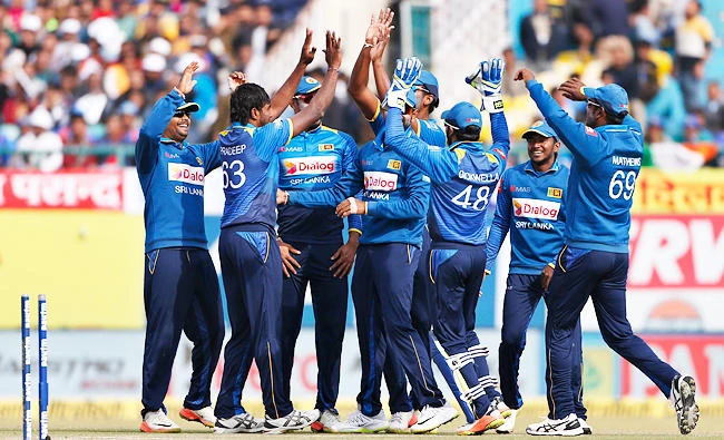 Sri Lanka's Nuwan Pradeep, second left, celebrates the dismissal of India's Shreyas Iyer during their first one-day international cricket match in Dharmsala, India, on Sunday. (AP)