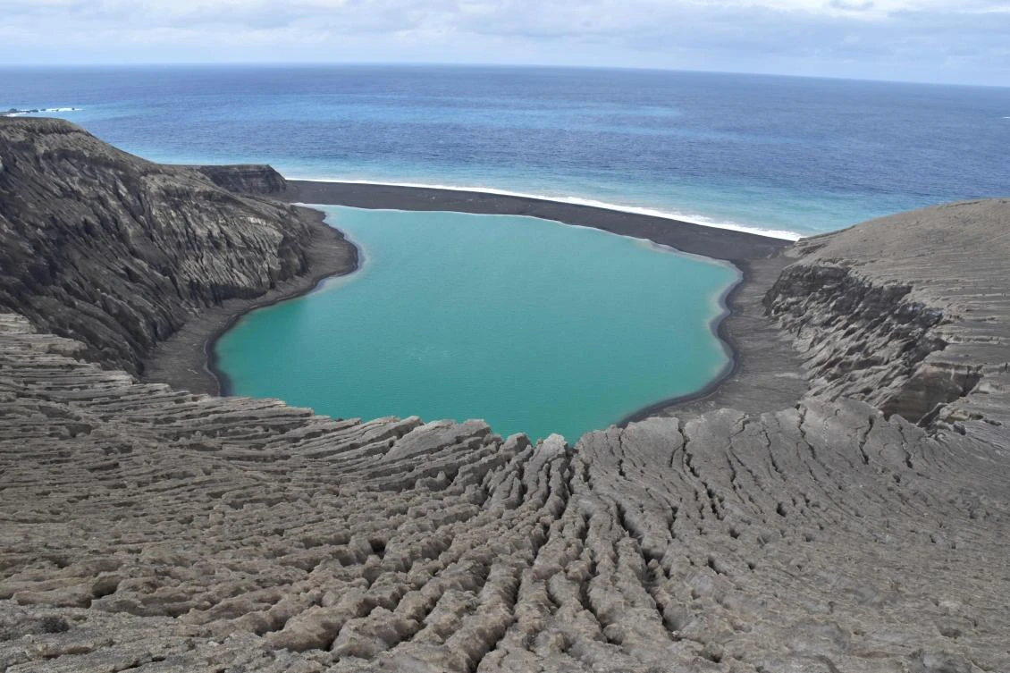 In this picture dated June 5, 2017 and received from NASA on December 13, 2017 shows a view of a recently-formed Tongan island, unofficially known as Hunga Tonga-Hunga Ha’apai, which had formed from a Pacific Ocean submarine volcano which erupted in late December 2014. (NASA/AFP)