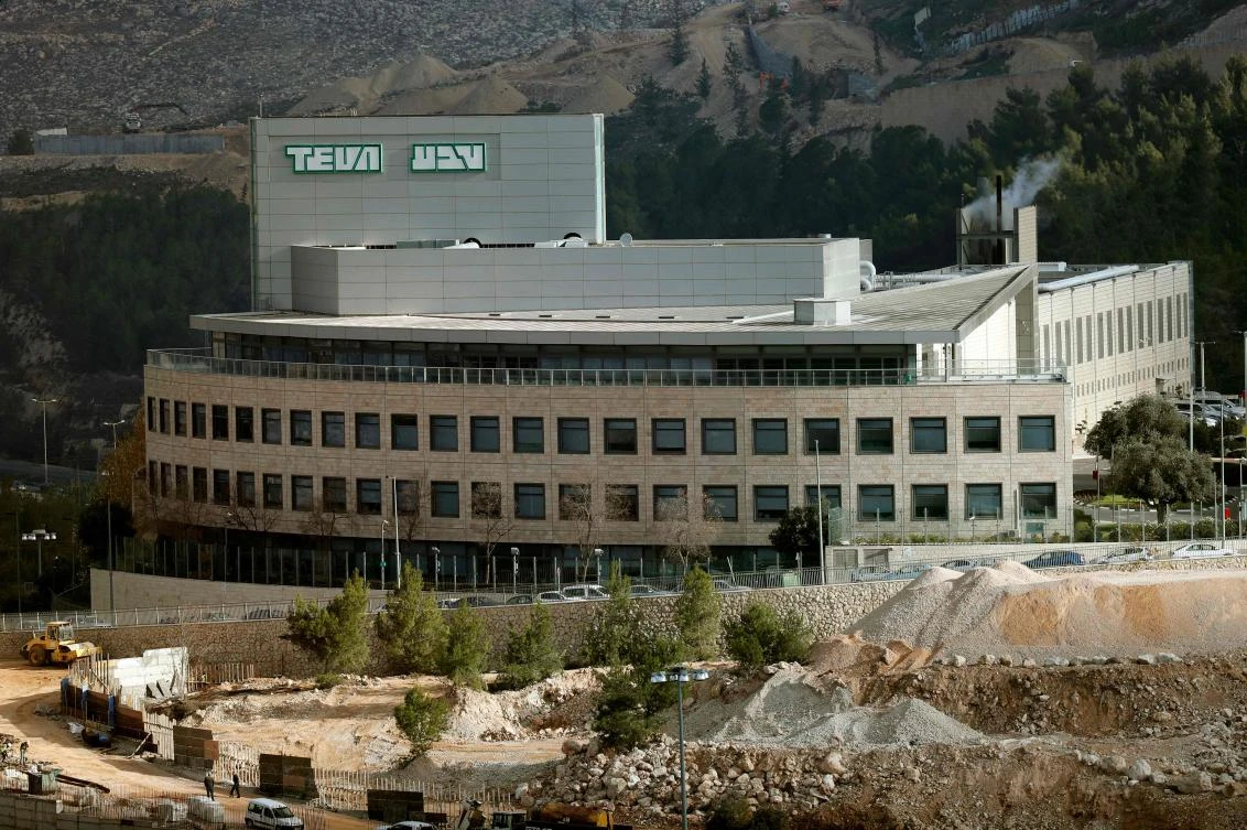 A picture taken on Dec. 14, 2017 shows the Jerusalem Teva plant, the world’s biggest manufacturer of generic drugs. Teva is to announce a cost-cutting program today that will include thousands of layoffs, according to widespread media reports. The Calcalist business newspaper said Teva intended to “cut over 4,000 jobs, mainly in the US and Israel” as it was saddled with almost $35 billion in debt. (AFP/Thomas Coex)
