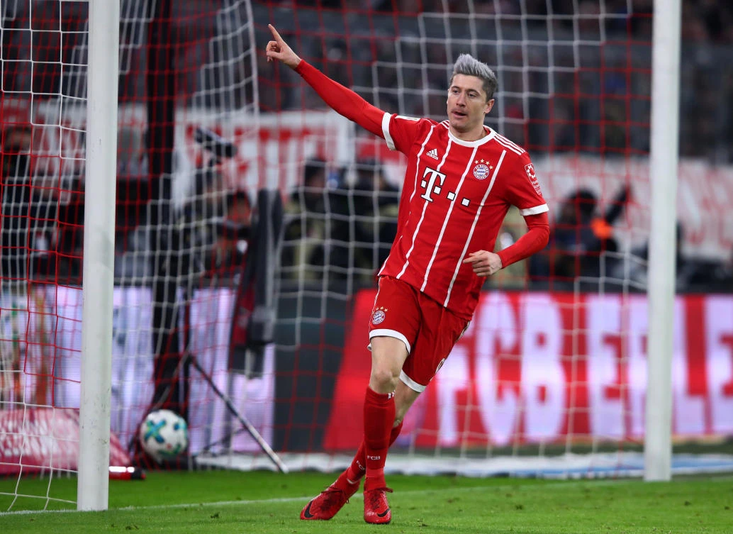 Soccer Football - Bundesliga - Bayern Munich vs FC Cologne - Allianz Arena, Munich, Germany - December 13, 2017 Bayern Munich's Robert Lewandowski celebrates scoring their first goal. (REUTERS)