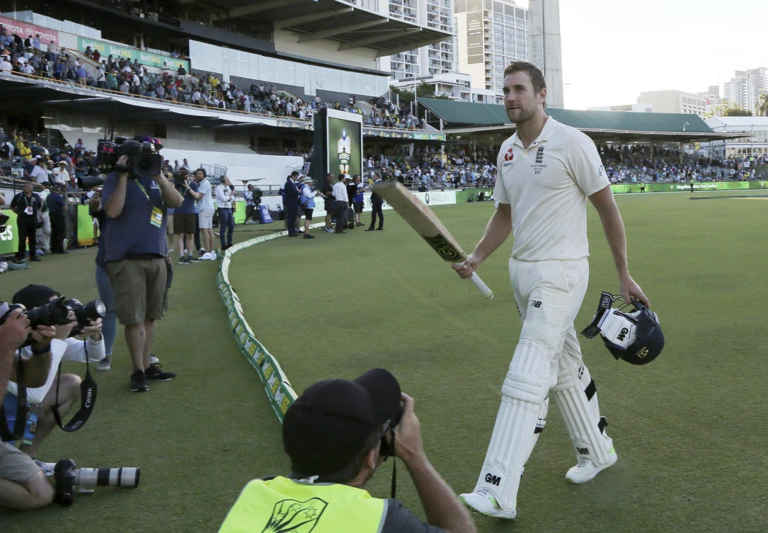 England's Dawid Malan walks off the pitch having scored his first Test century. (AP)
