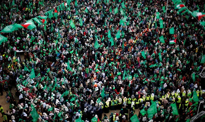 Palestinian Hamas supporters take part in a rally marking the 30th anniversary of the group's founding, in Gaza City, on Thursday. (Reuters)