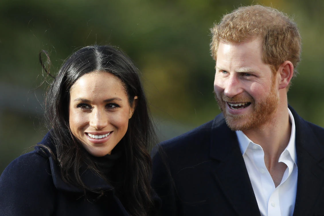 Britain’s Prince Harry and his fiancee Meghan Markle. Prince Harry’s fiancee is set to join Britain’s royal family for Christmas. Kensington Palace says Meghan Markle will join Queen Elizabeth II and other senior royals at Sandringham, a sprawling estate in Norfolk, 110 miles (175 kilometers) north of London, it was announced on Wednesday, Dec. 13, 2017. (AP/Frank Augstein, File)