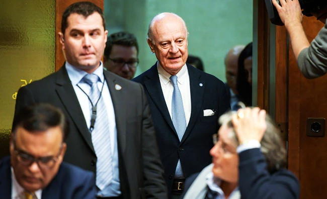 UN Special Envoy for Syria Staffan de Mistura (C) attends to a press conference closing a round of Intra Syria peace talks at the European headquarters of the United Nations offices in Geneva, on Thursday. (AFP)