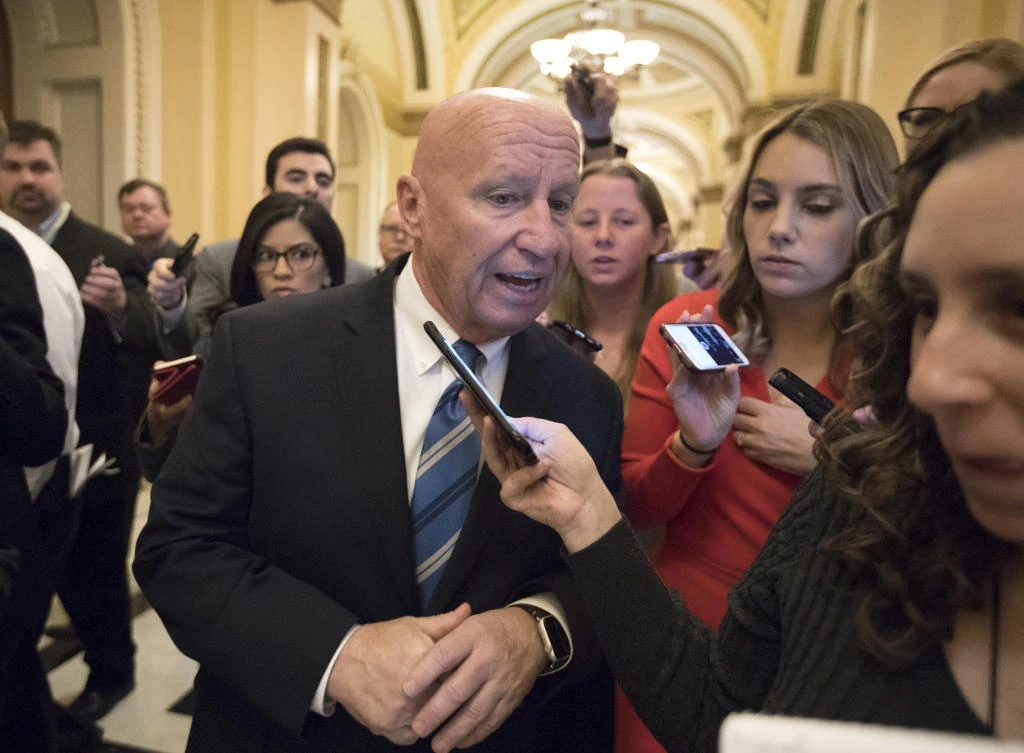 House Ways and Means Committee Chairman Kevin Brady, R-Texas, talks to reporters after signing the conference committee report to advance the GOP tax bill on Friday. (AP)