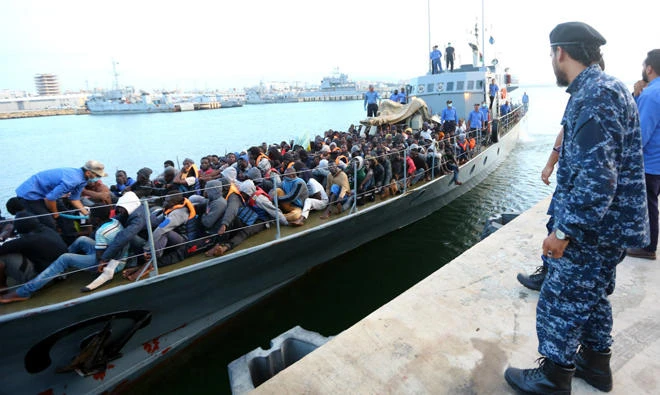 Immigrants rescued by the Libyan coastguard arrive at a naval base in the capital Tripoli in this file photo. (AFP)