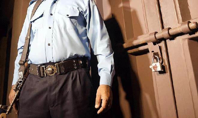 A policeman stands guard outside the office of an NGO in Islamabad. (File photo/AFP)