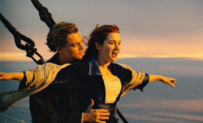 This image released by Paramount Pictures shows Leonardo DiCaprio, left, and Kate Winslet in a scene from "Titanic." The film is among the 25 movies being added to the prestigious National Film Registry. (Paramount Pictures via AP)