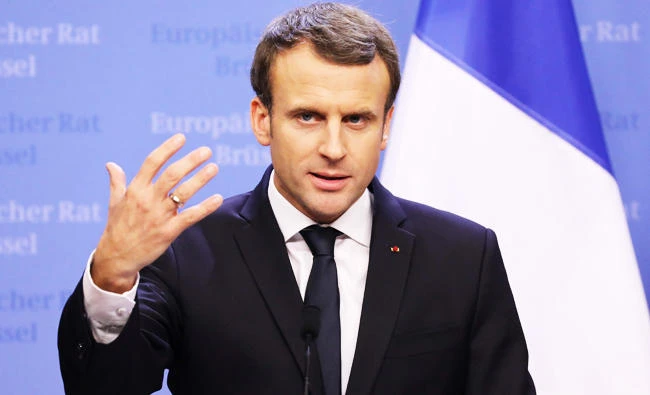 France's President Emmanuel Macron and Germany's Chancellor give a joint press conference at the end of a European Union summit in Brussels, in this December 15, 2017 photo. (AFP)