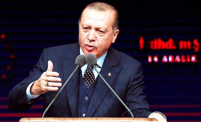 Turkish President Recep Tayyip Erdogan delivers a speech during the awards ceremony for National Employment Mobilisation as part of an Employment Council meeting in Ankara, in this December 14, 2017 photo. (AFP)