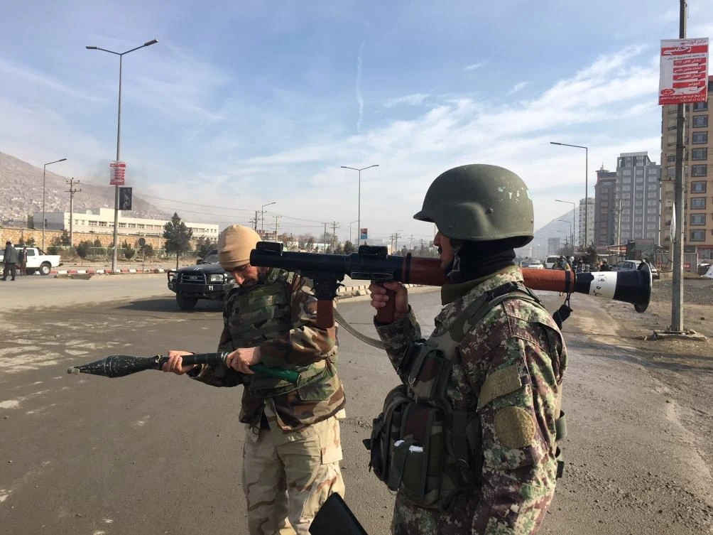 Afghan security personnel arrive at the site of complex attack at an intelligence training center in Kabul, Afghanistan, Monday, Dec. 18, 2017. (AP)