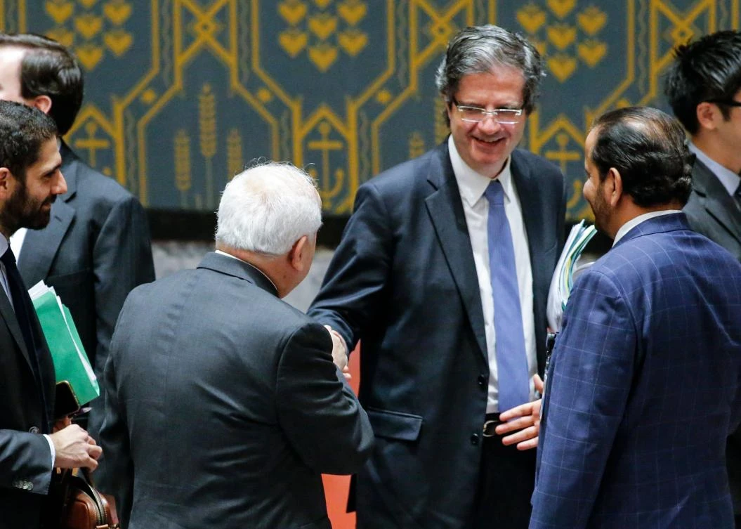 Riyad H. Mansour, Palestine's Ambassador to the United Nations (L) speaks with France's Ambassador to the UN Francois Delattre (R) after a UN Security Council meeting over the situation in the Middle East on December 18, 2017, at UN Headquarters in New York. The UN Security Council is to vote on a draft resolution rejecting US President Donald Trump's recognition of Jerusalem as the capital of Israel. (AFP)