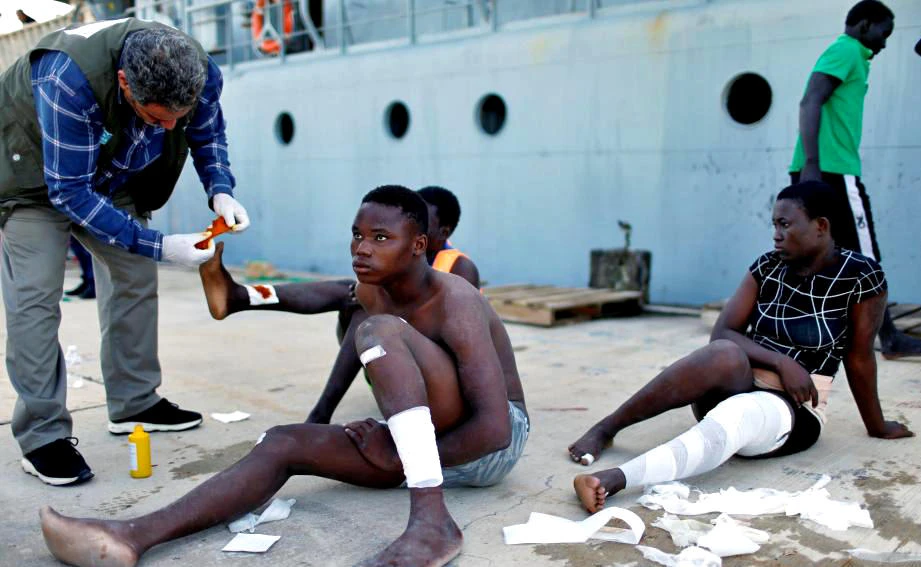 This file photo shows migrants arrive at a naval base after they were rescued by Libyan coastal guards in Tripoli, Libya November 6, 2017. (REUTERS)