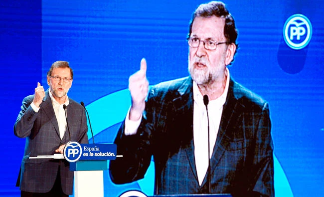 Spanish Prime Minister Mariano Rajoy speaks during a Catalan Popular party campaign meeting for the upcoming regional election in Salou on Sunday. (AFP)