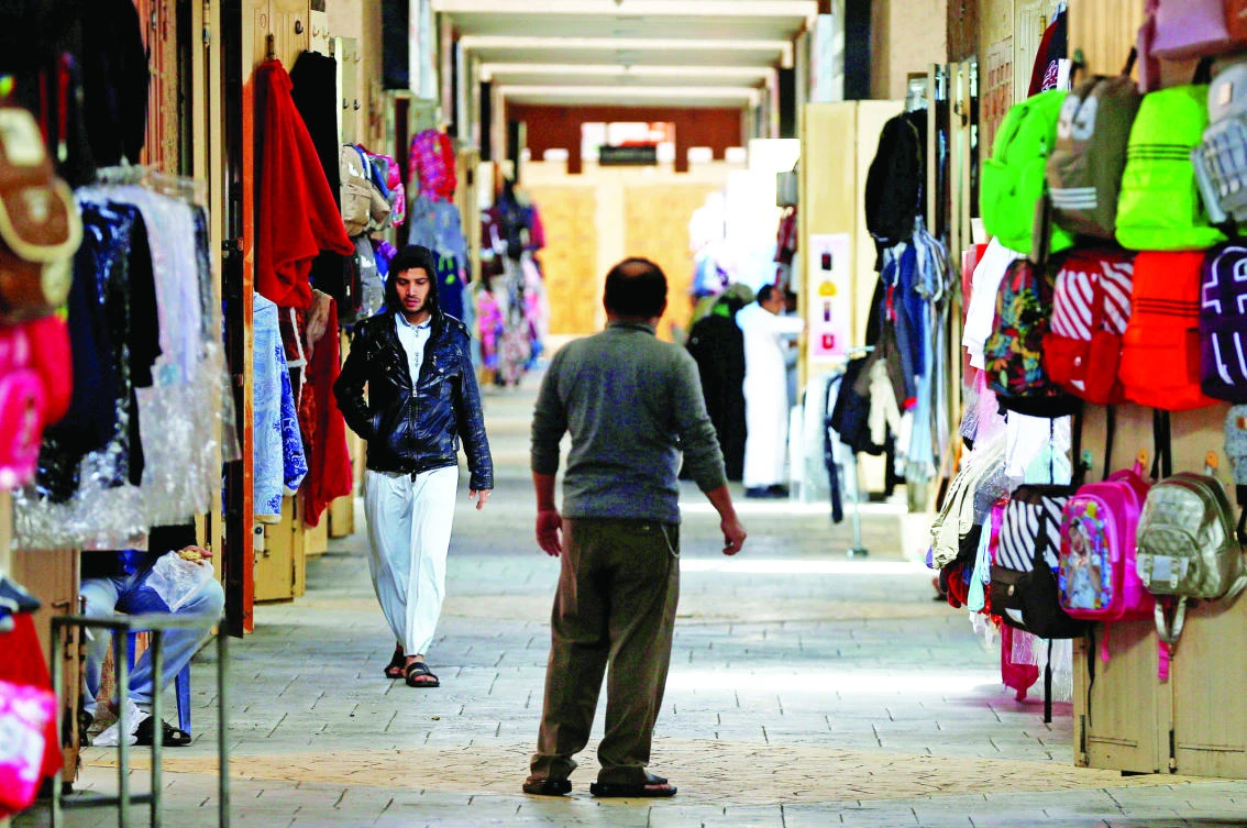 A man walks through a market in Riyadh. After austerity, retail is among the sectors that stand to benefit from any increase in economic stimulus coming from today’s budget. (Reuters)