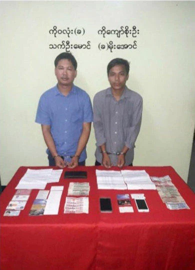 Reuters journalists, Wa Lone (L) and Kyaw Soe Oo, are seen in a photo, released on December 13, 2017 by Myanmar Ministry of Information, after they were arrested. (Myanmar Ministry of Information via Reuters)