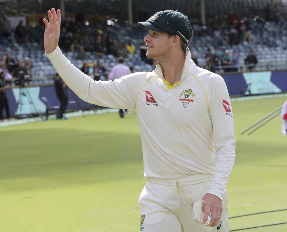 Australia's Steve Smith waves after winning their Ashes cricket test match against England in Perth, Australia, Monday, Dec. 18, 2017. Australia won by an innings and 41 runs. (AP Photo/Trevor Collens)