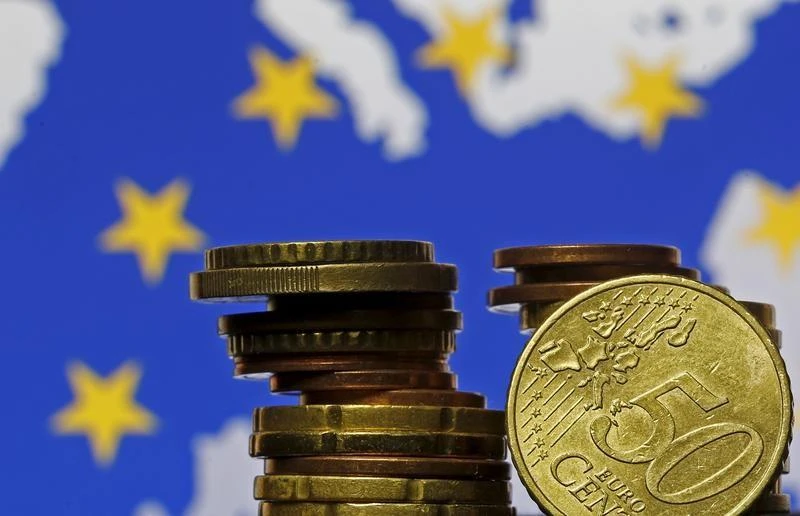 Euro zone wage growth pulls back from two-year high