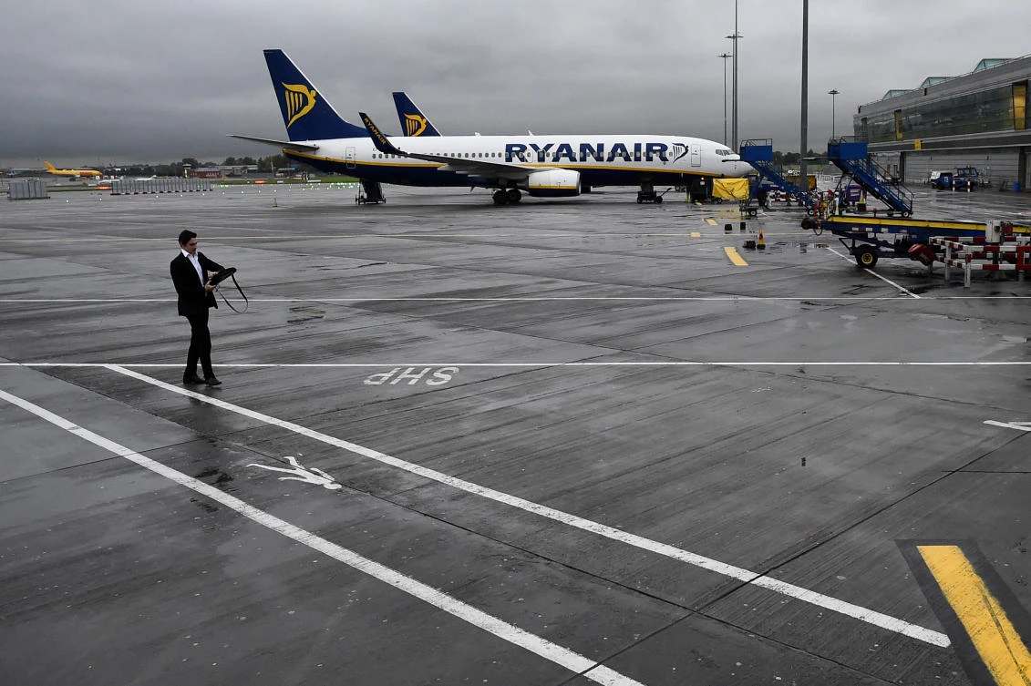 A man walks past a Ryanair aeroplane at Stansted airport in London, Britain September 27, 2017. (REUTERS)