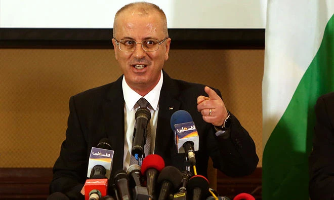 Palestinian Prime Minister Rami Hamdallah speaks during a press conference in Gaza City, on Dec. 7, 2017. Hamdallah's visit aims to push forward the implementation of a reconciliation deal Egypt brokered between Hamas and its rival Fatah party in October. (AP)