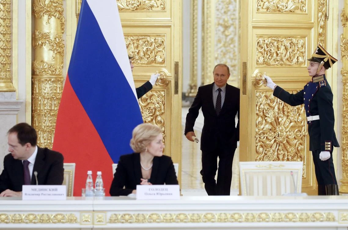 Russian President Vladimir Putin arrives to chair a meeting at the Kremlin in Moscow on December 21, 2017. (AFP)