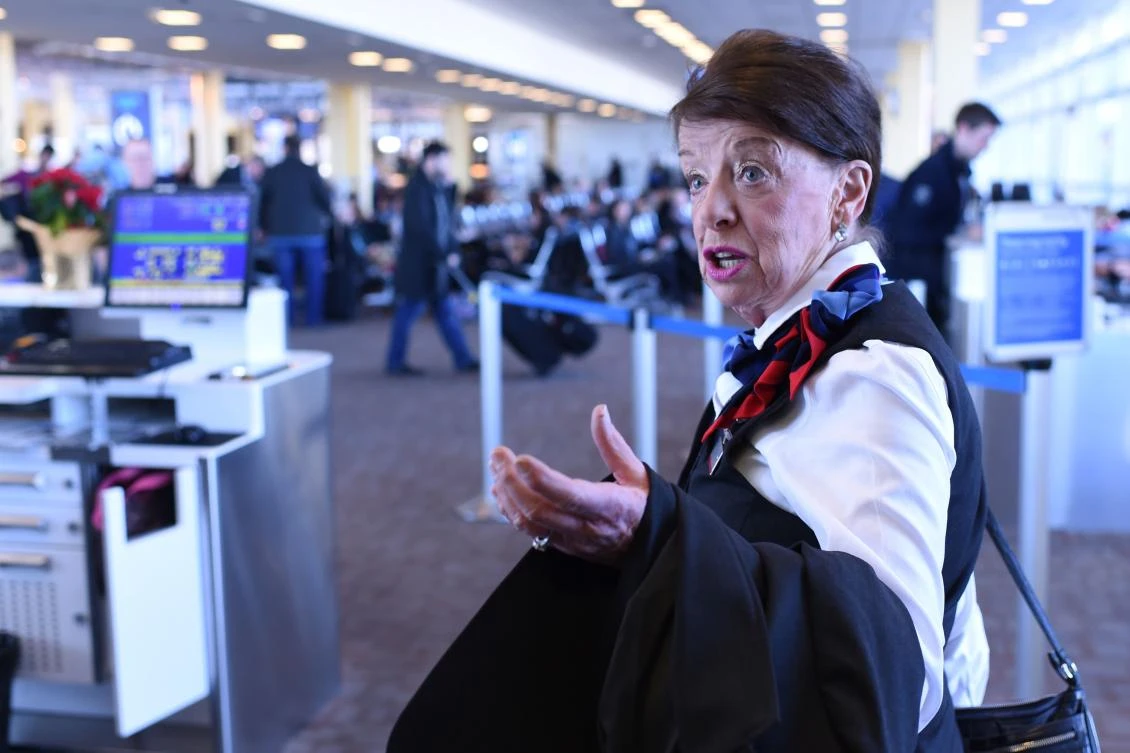 American Airlines’ longest-serving flight attendant, Bette Nash, walks in the airport corridors after disembarking from her daily return flight to Boston at Ronald Reagan Washington airport in Arlington, Virginia on December 19. (AFP)
