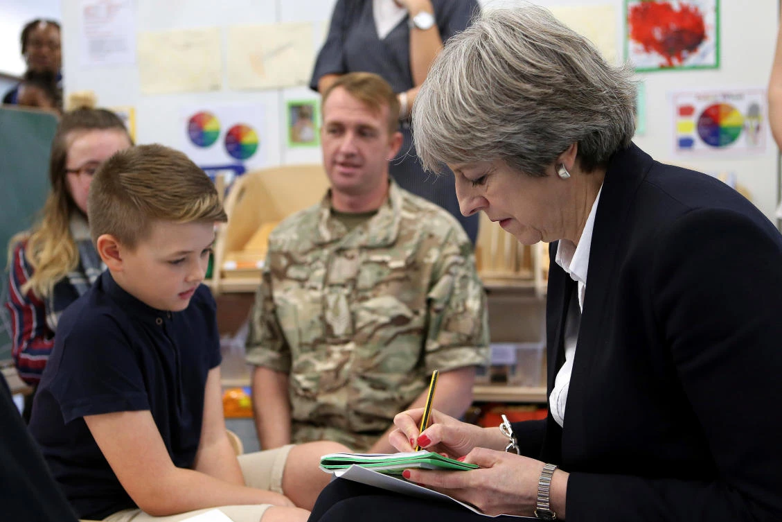May hails terror victory overseas amid festive season unease at home