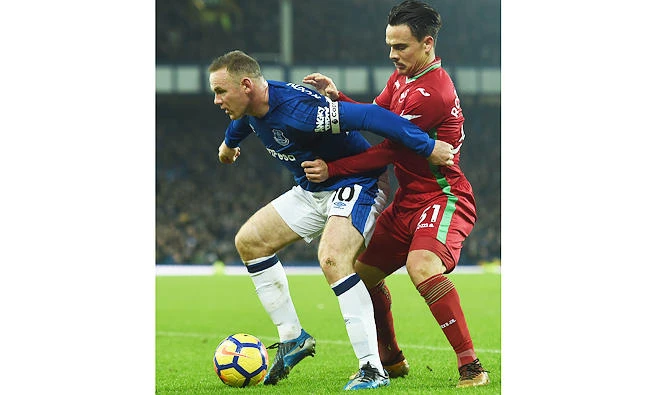 Wayne Rooney has been clever with his back to goal and smart in front of goal following his return to Everton from Manchester United. (AFP)