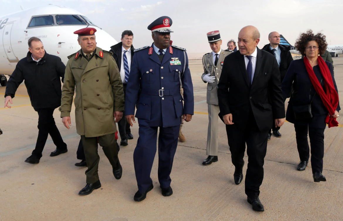 French Foreign Minister Jean-Yves Le Drian is received by east Libyan government air force commander Saqr Al-Jaroushi at Benina airport near Benghazi, Libya, Libya. (Reuters)
