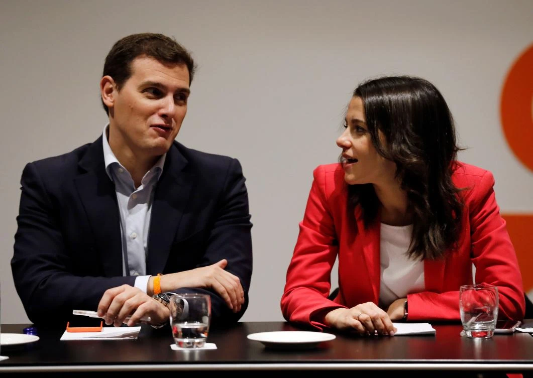 Center-right party Ciudadanos (Citizens) candidate Ines Arrimadas (R) and the party leader Albert Rivera attend a party meeting in Barcelona on December 22, 2017. (AFP)