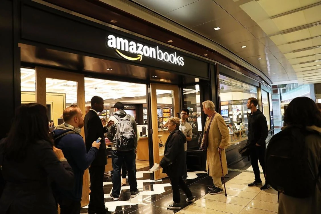 Above, customers enter the newly opened Amazon Books on May 25 in New York City, the online retail giant’s first brick-and-mortar bookstore. (AFP)