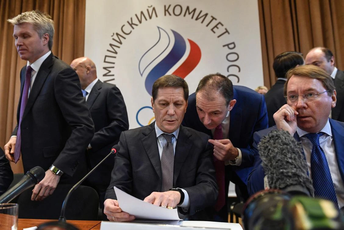 The President of the Russian Olympic Committee, Alexander Zhukov (C) prepares to start a meeting in Moscow on December 12, 2017 on deciding how to respond to IOC ban on Russia participating in Winter Games. (AFP)