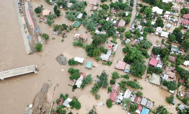 This handout photograph released by Project LUPAD on December 23, 2017, shows an aerial image taken by a drone of the city of Cagayan de Oro on the Philippines' island of Mindanao on December 22, 2017, after the area was struck by Tropical Storm Tembin. (AFP)