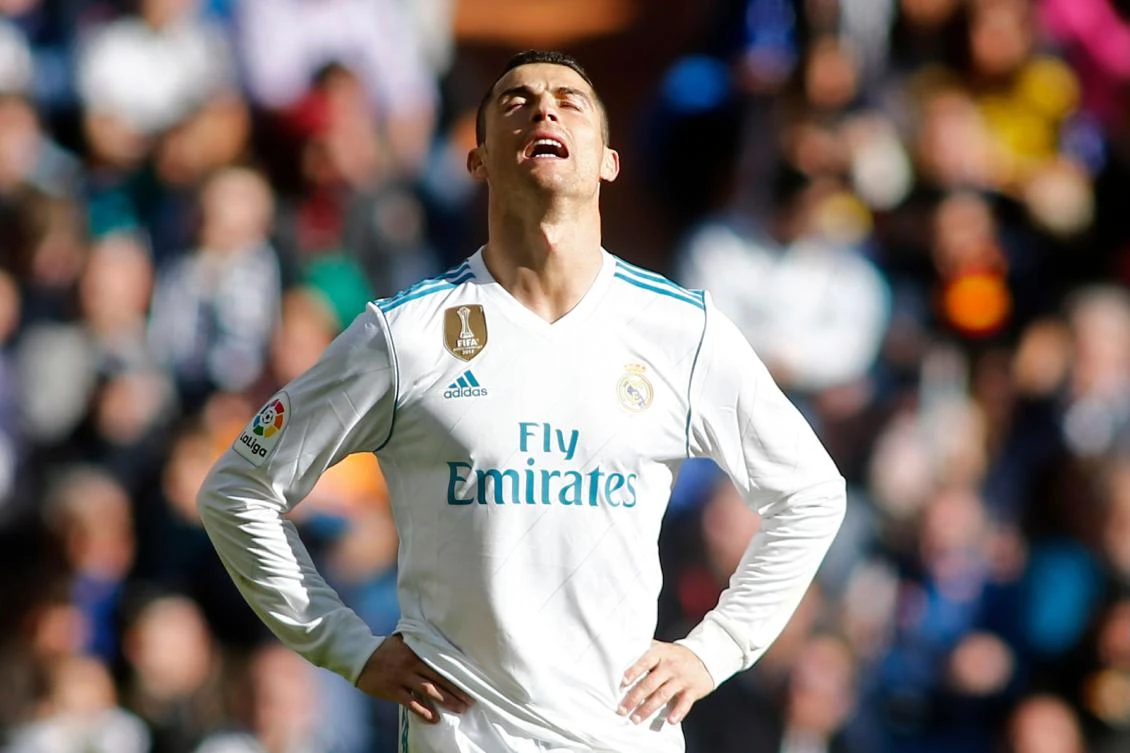Cristiano Ronaldo's frustration at defeat in El Clasico is mirrored in his contract talks with Florentino Perez. (AFP)