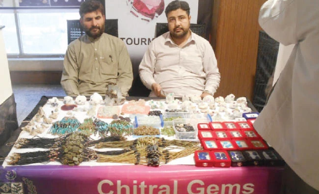 Participants display their products at the Karazhi gem bazaar. (AN photo)
